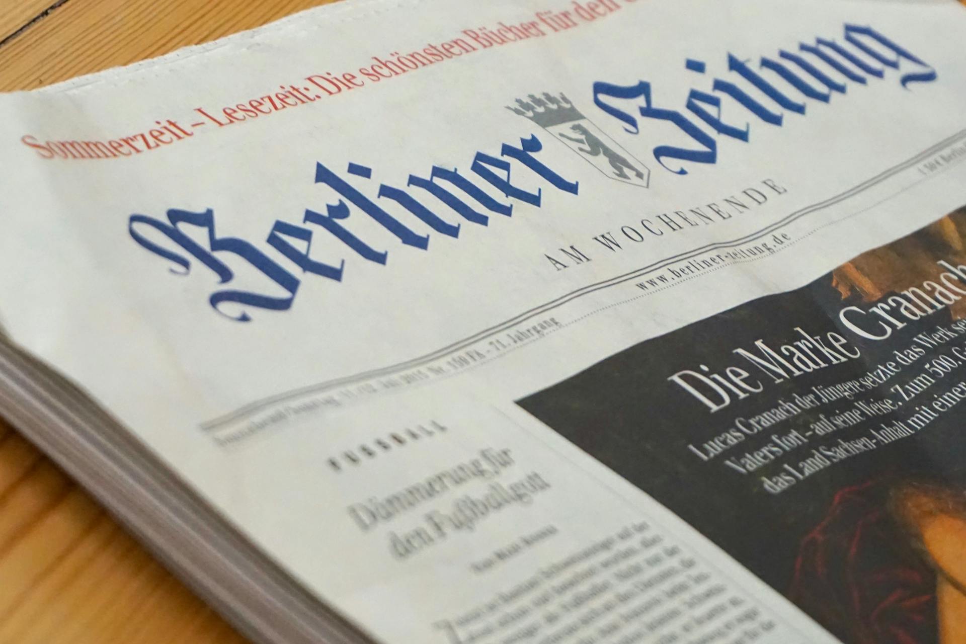 A German newspaper sits on a white background